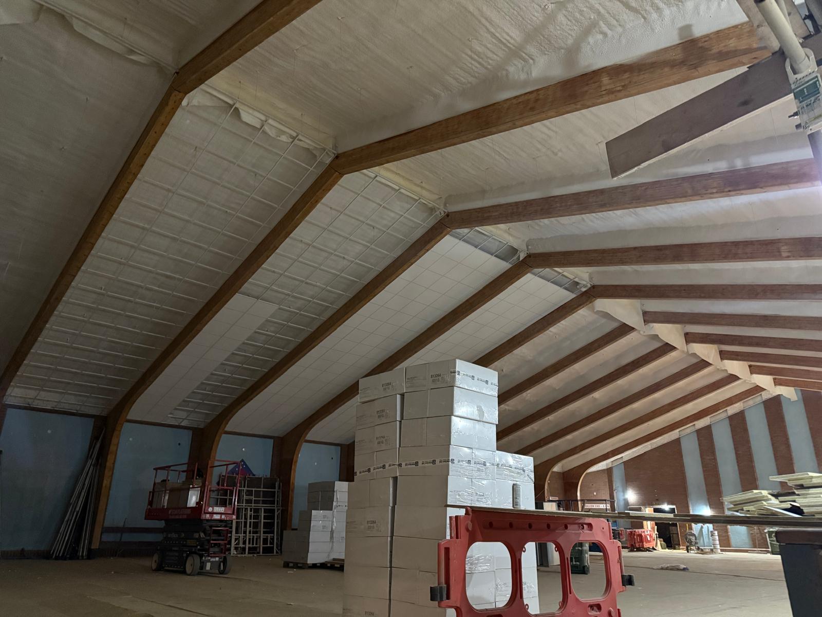 Pool hall roof insulation completed with spray foam